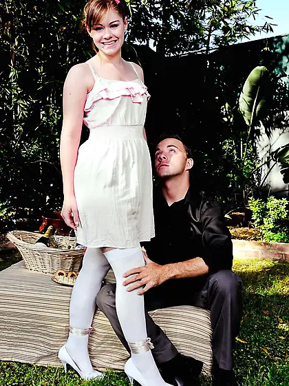 Beautiful babe in sexy outfit seducing guy with stockings upskir