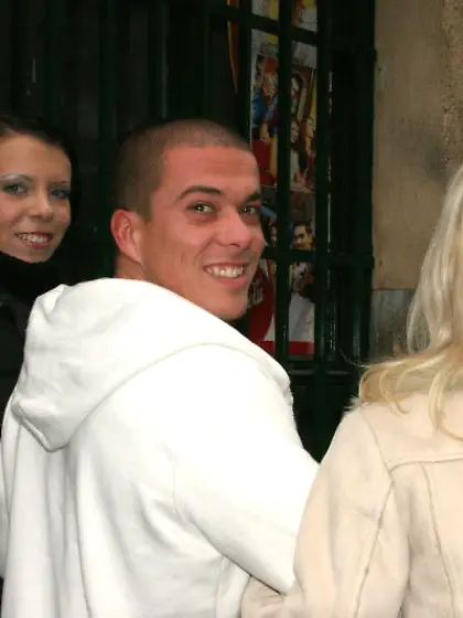 Short-haired blonde and her brunette GF fucking on a big bed