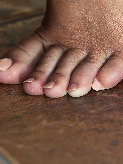 Transparent get-up brunette loves her own feet,  her tiny tits an