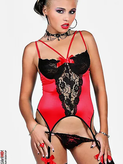 A corset and black stockings make Axelle Parker look glamorous a