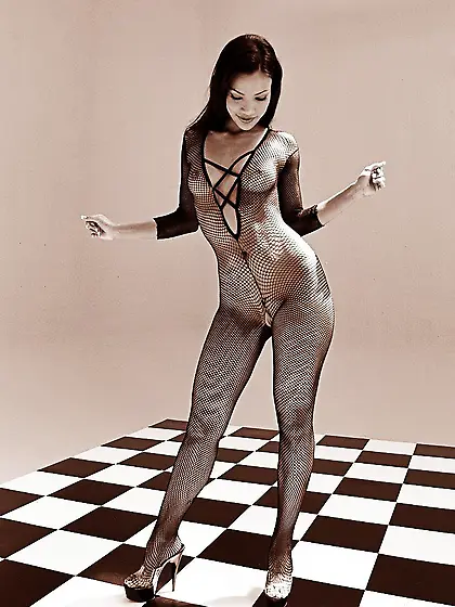 Perfect bodied glamour model Adriana Sage strips out of her fish