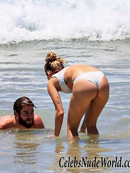 Miley Cyrus Wearing A Thong Bikini On A Beach In Australia