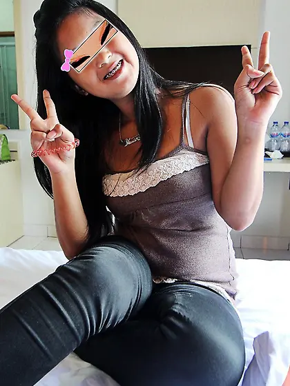 Thai girl with braces spreads legs under the condition that she