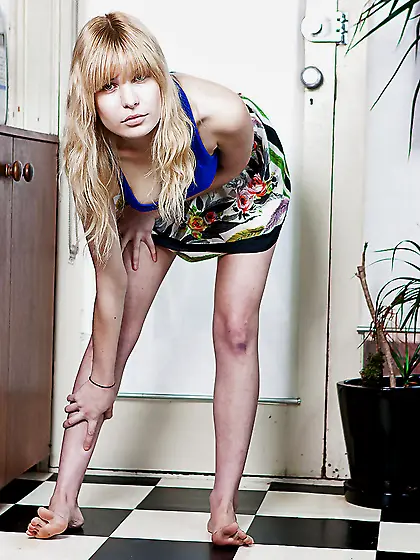 Jennifer Mendez strikes a few sexy poses on the floor too