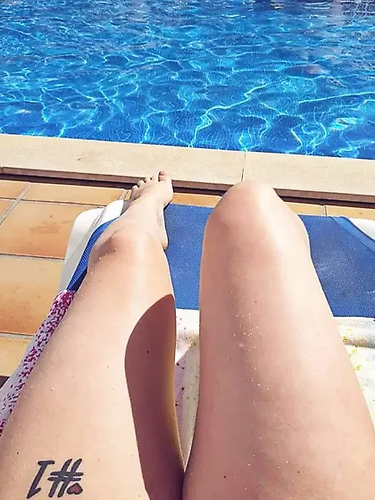 British Daughter pool selfie for dad legs and feet
