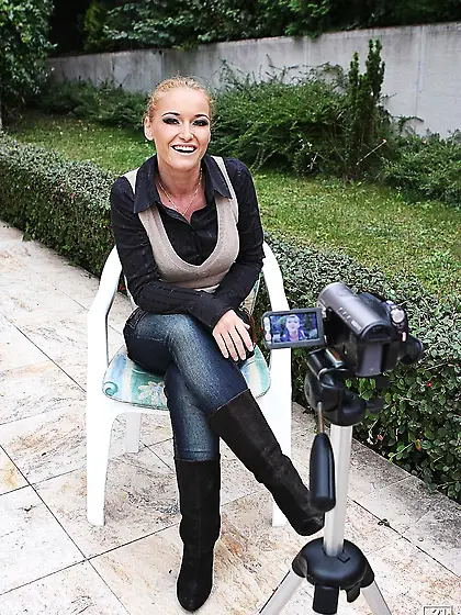 Clothed beautiful porn model Kathia Nobili gives interview in th