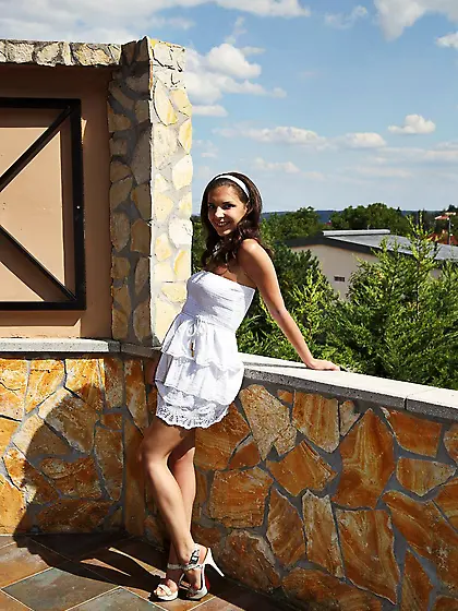 Full titted brunette Henessy Nubiles strips then pisses and stuf