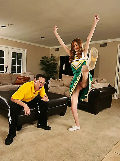 Lovely redhead princess wearing green dress is enjoying passiona