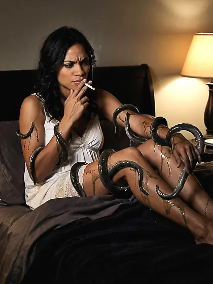 smoking woman captured by tentacles
