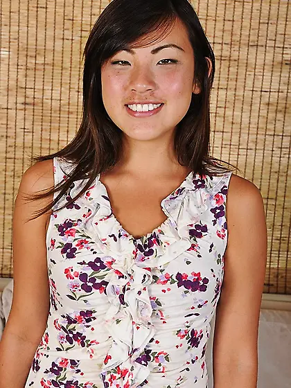 Tanned Asian brunette takes off her purple lingerie for the came