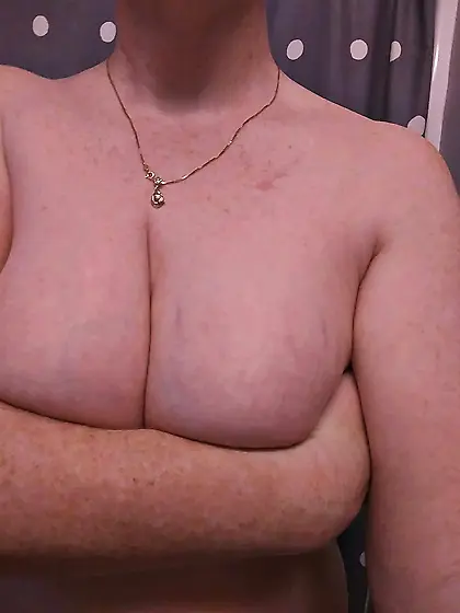 Wendy's saggy redhead tits exposed by husband