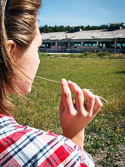 Slut bound and tied outdoors shows her moist...