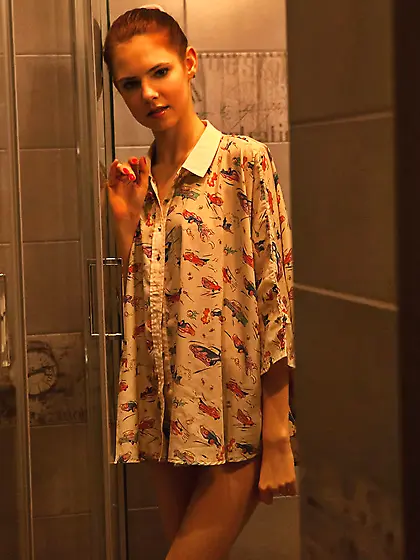 Lanky redhead with blue-eyes sliding her tiny panties to the sid