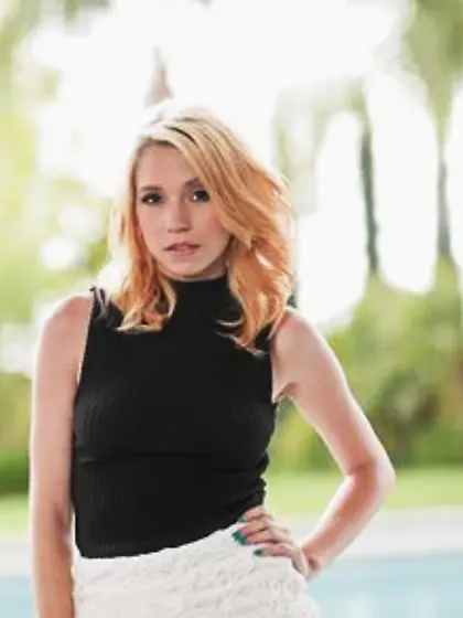 Sexy blonde reveals her big perky breasts and cute pussy when st