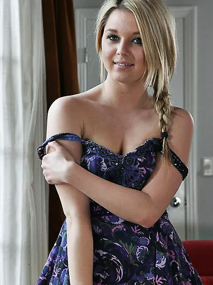 Blonde Chloe Lynn with perky tits strips naked and spreads her b