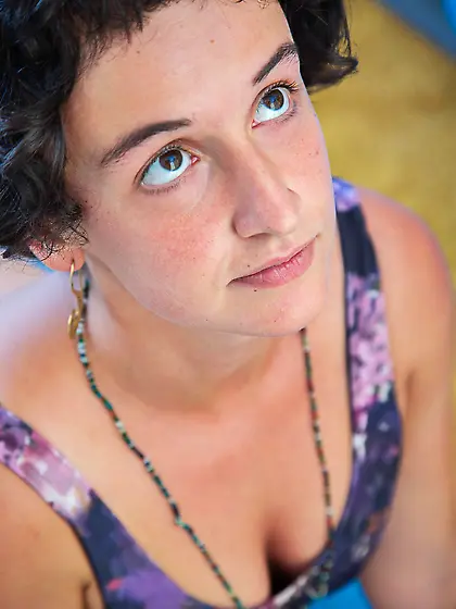 Brunette with big hair showing her small tits and great bush