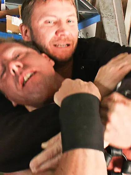 Inked dude fucks tied