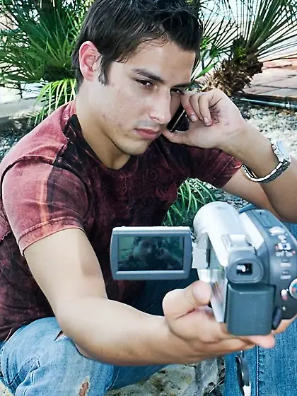 Sexy guy strips clothes