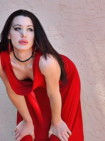 Raven haired model drills