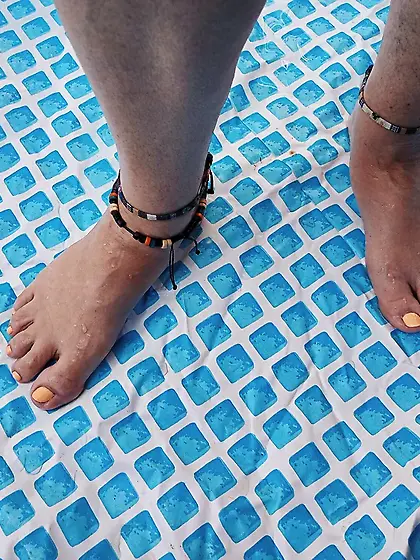 Girlfriends Feet in the pool