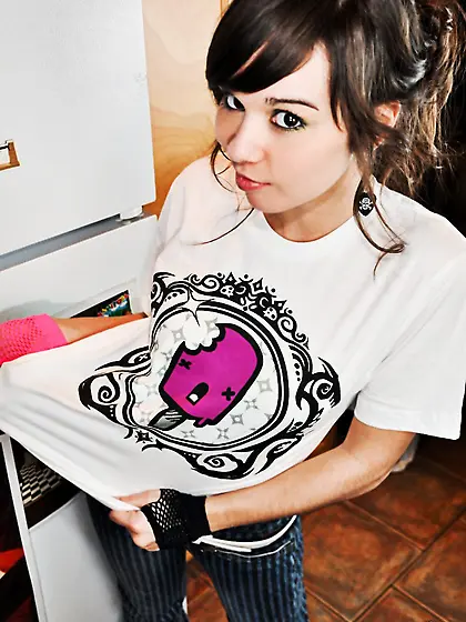 Though Ariel Rebel loves funny T-shirts,  she loves taking them o