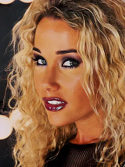 Voluptuous busty Kristi Myst in latex spreads her legs and fondl