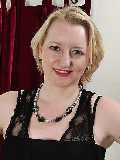 Aroused golden haired milf Anya Volcov enjoys in revealing her b