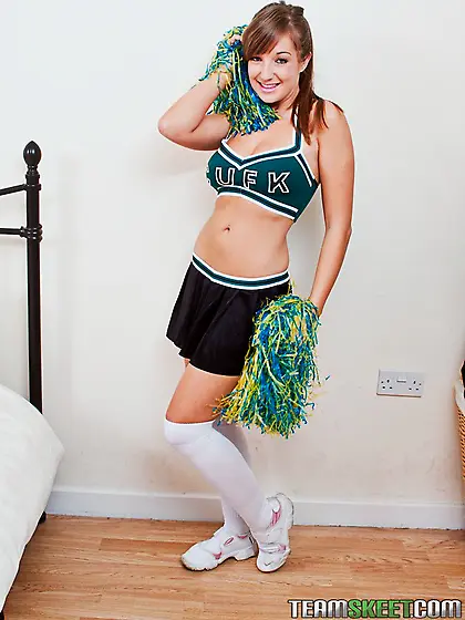 Busty cheerleader Cate Harrington in white panties bangs herself