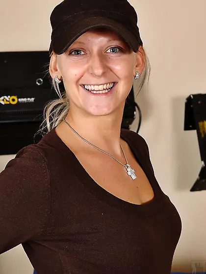 Candy Milli in black cap and hot lingerie twirling her round ass