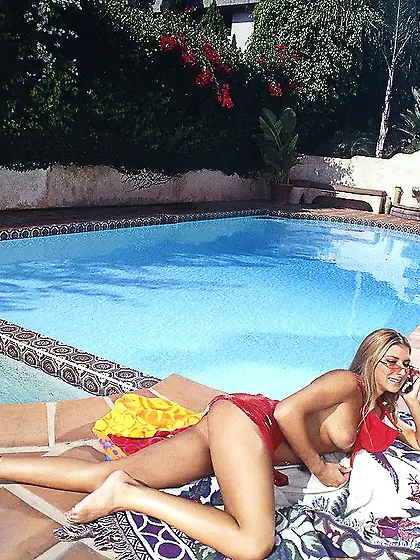 Alluring blonde hottie Kila Lynn strips by the pool and shows us