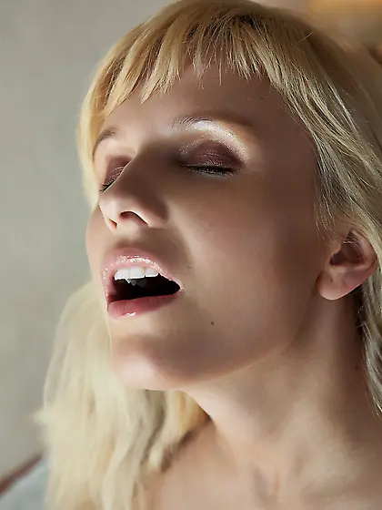 This blonde babe has huge tits!