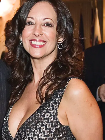 Virginia strikes a pose while showing her tits