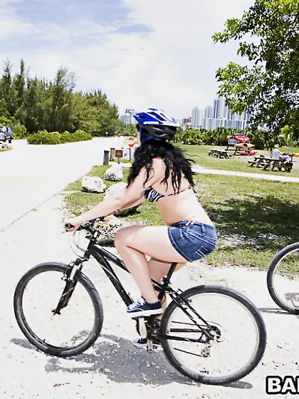 Ava Rose strips her bicycling gear off outdoors and then fucks w