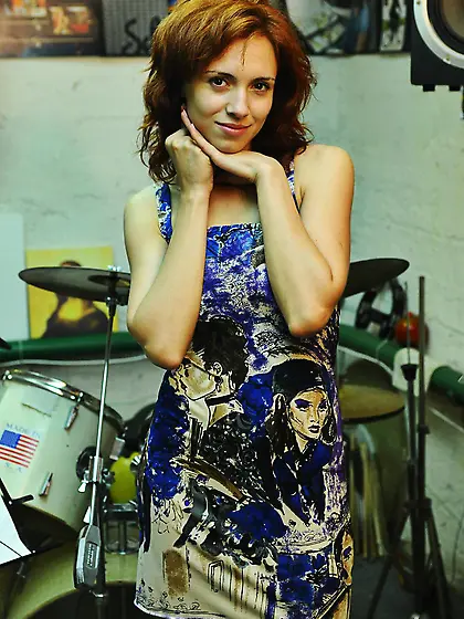 Cute perky breasted redhead Leka C plays with the camera and giv