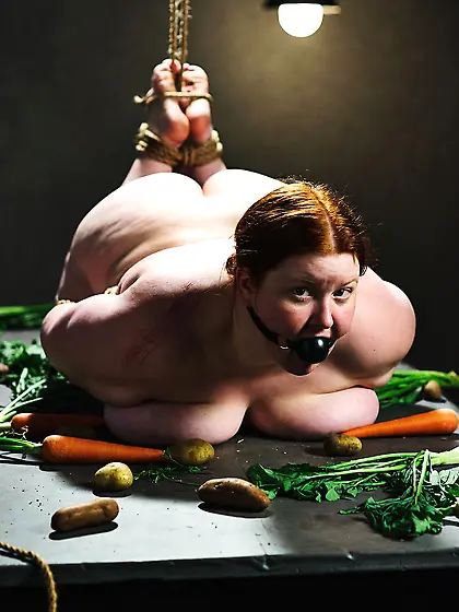 Hogtied curvy redhead