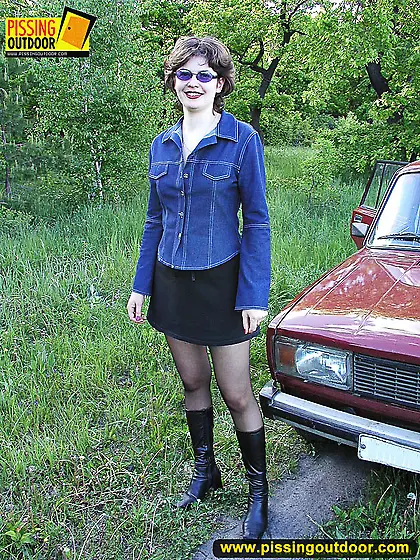 Pissing sitting on the car