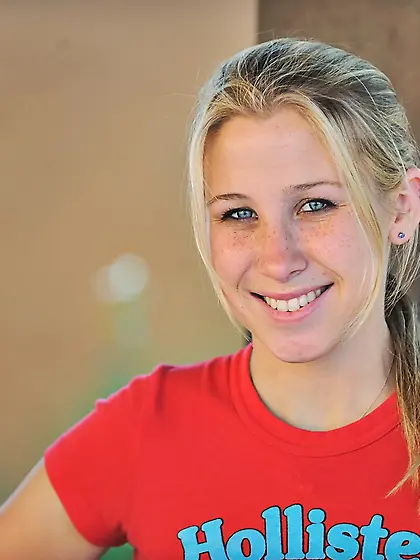 Adorable young blonde having big boobs is playing with her dildo