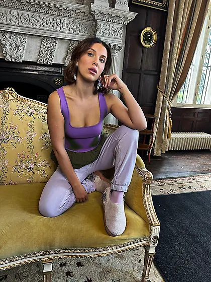 Millie Bobby Brown in a purple top