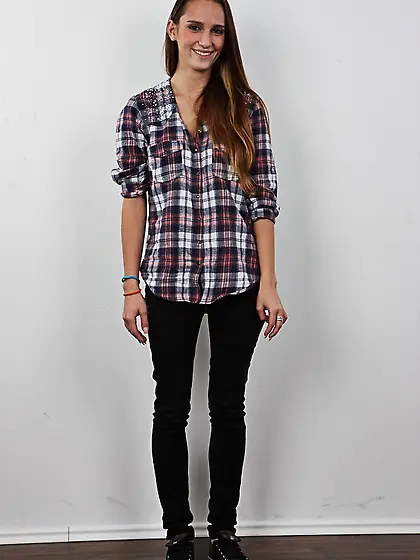 Skinny waitress hands beers