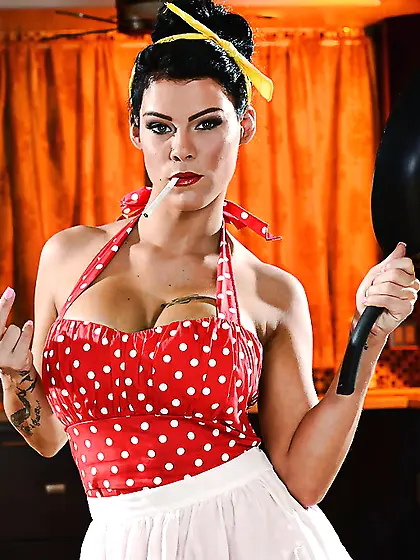 Brunette housewife in polka-dot red dress allows her round girls