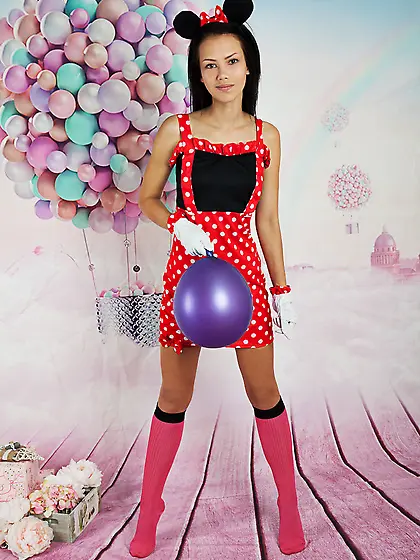 Young teen in cute outfit shows her assets during photoshoot in