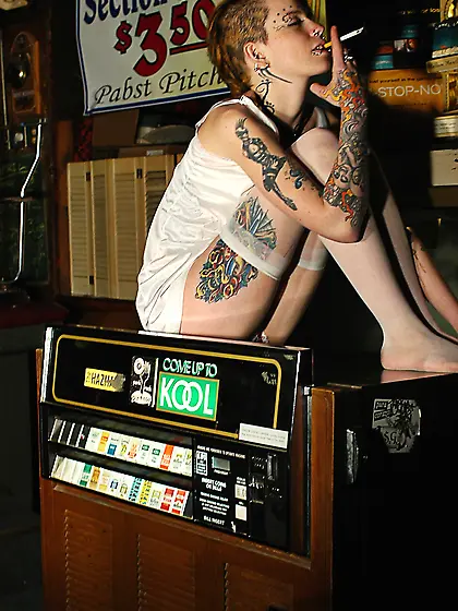Rachel Face performs a striptease at an empty bar