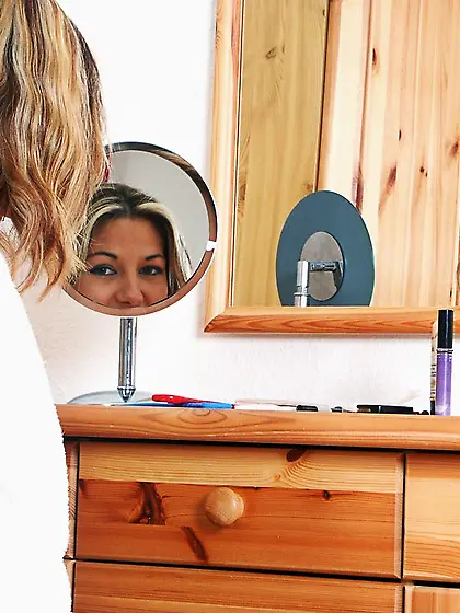 Lovely Vanessa drops down her red lingerie and shows her tits an