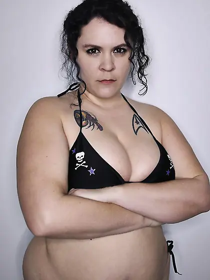 BBW dyke gets banged by a strap-on wearing...