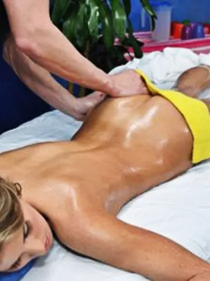 Lovely brunette’s face is covered with cum after erotic massage