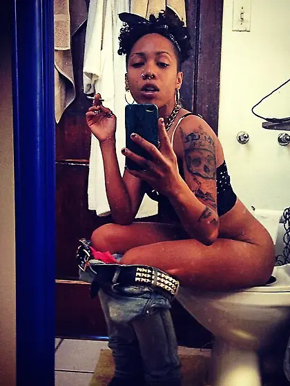 Ebony Women on the toilet