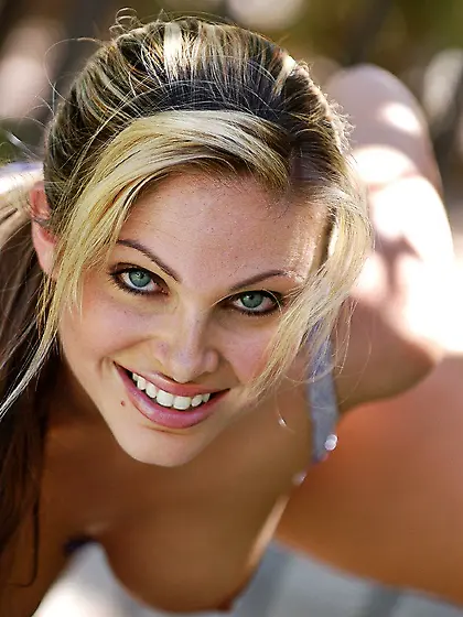 Blue-eyed blondie in sexy lingerie having lots of fun for the ca