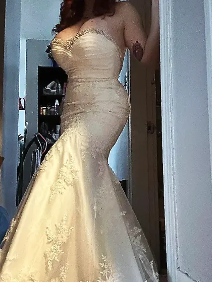 Busty future slut 32H showing off wedding dress