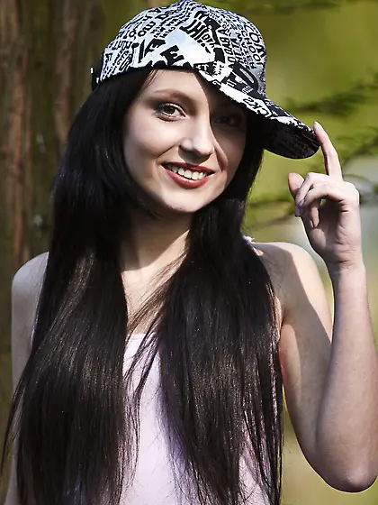 Long-haired Russian brunette stripping in the forest to reveal s