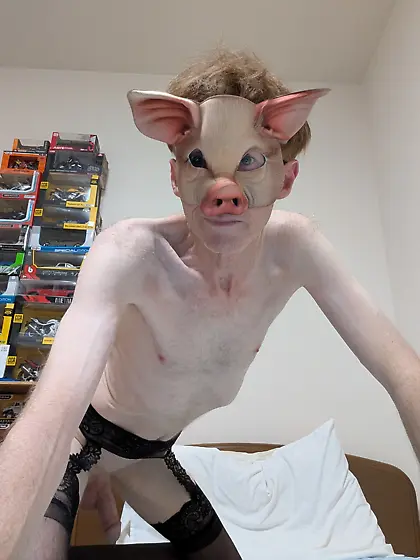 Me wearing various kink masks and fox tail butplug